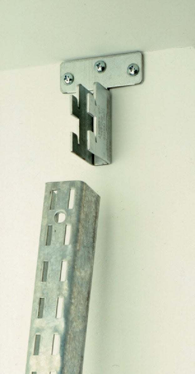 Galvanized steel fast-mount shelf bracket mounted on wall for sturdy storage and organization solutions in shelving accessories