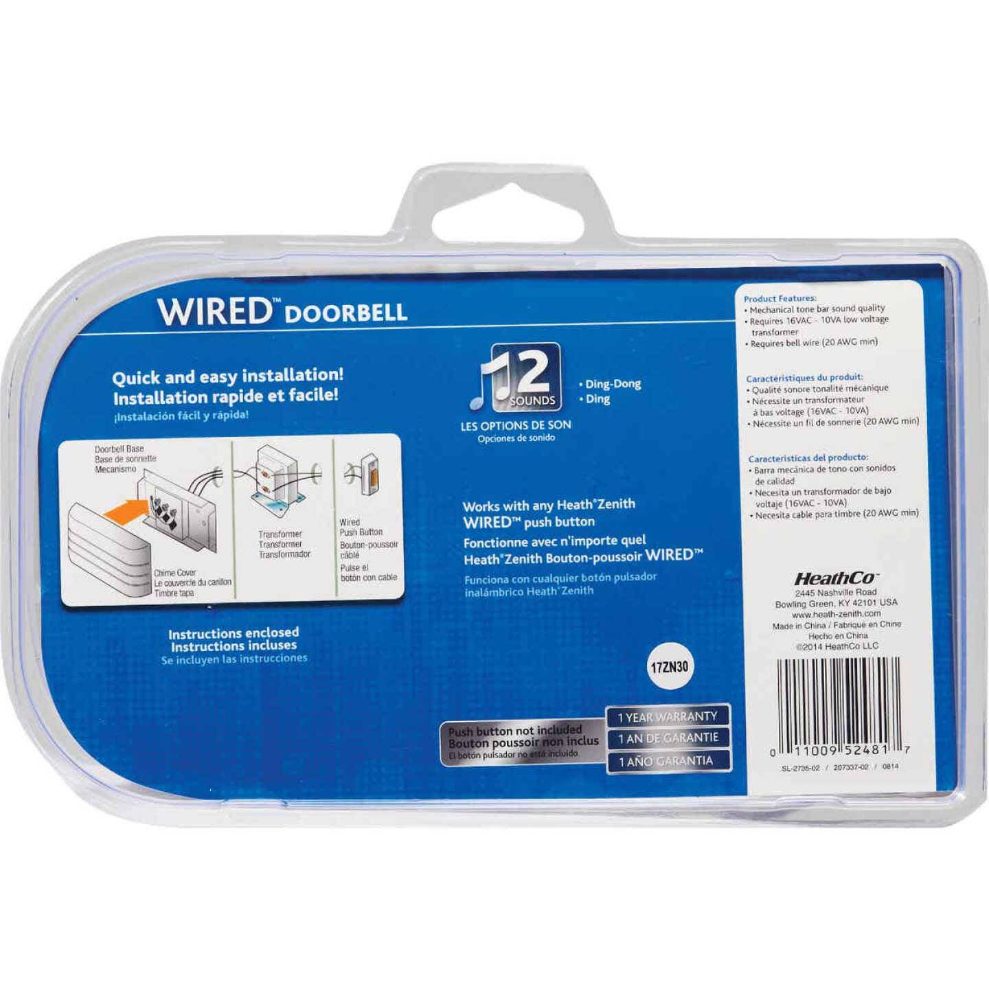 Blue and white packaging showing instructions and features for a wired white round doorbell in home improvement use