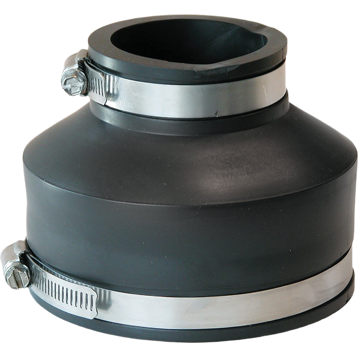 Flexible PVC plumbing coupling with stainless steel clamps for connecting pipes in home improvement tasks