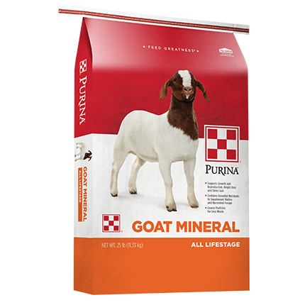 Red and orange bag of Purina mineral supplement goat feed with image of a brown and white goat on the front