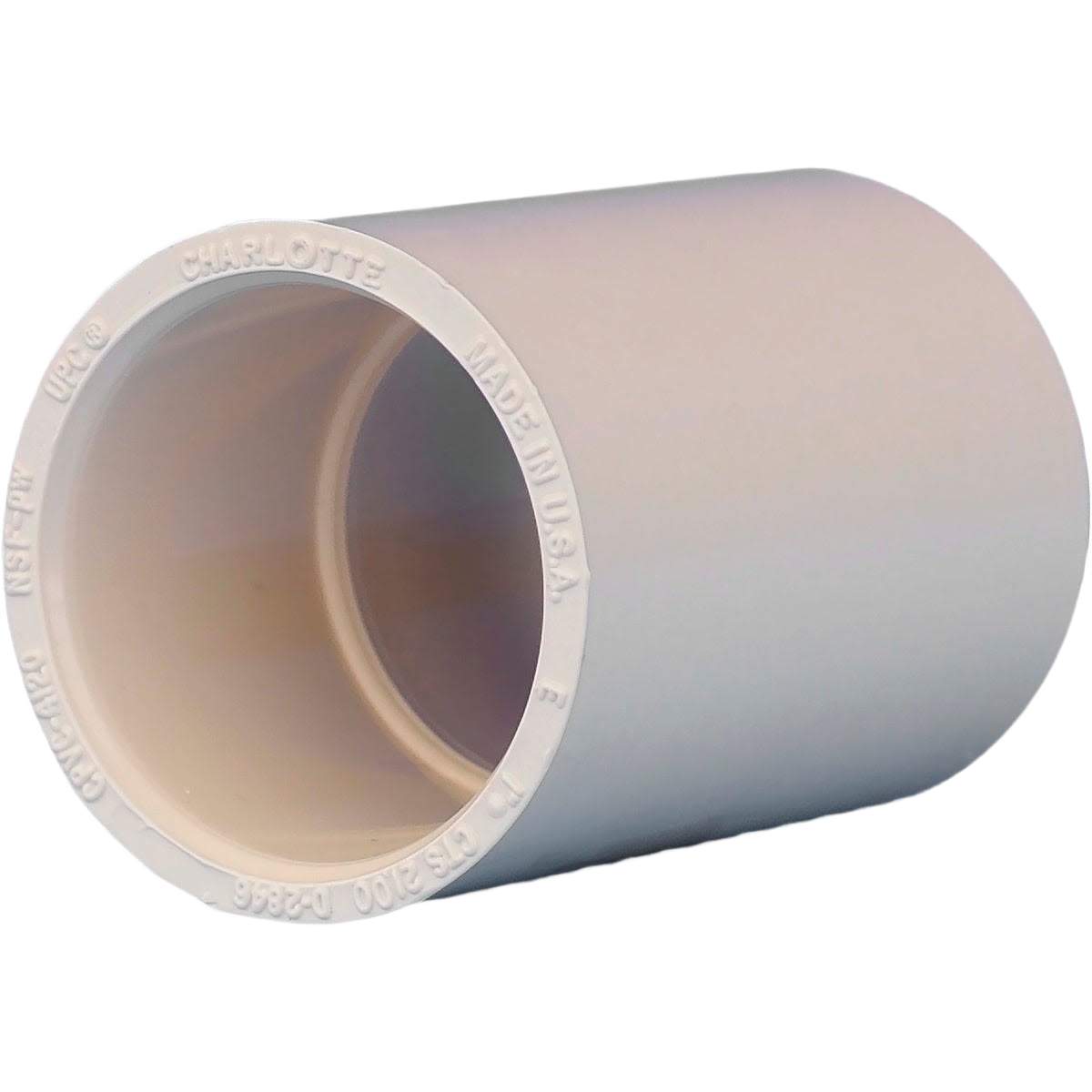 Beige CPVC reducing coupling with stop for plumbing, suitable for pipes and fittings in home improvement projects under $50.