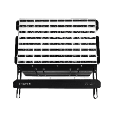 Black and white Shaper Tools Workstation top grid with clamping slots for precise tool setup and home improvement projects