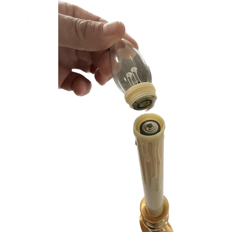 Hand replacing a clear LED candle bulb into a cream-colored window candle holder for Christmas lights decor under $50