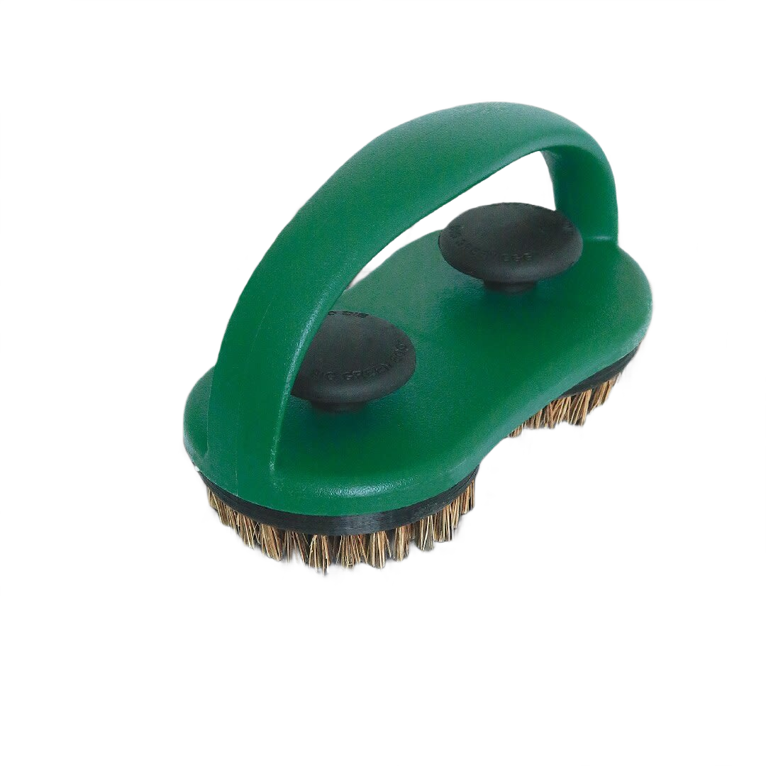 Green grill brush with dual palm bristle pads and ergonomic handle for effective grill cleaning and outdoor living tasks