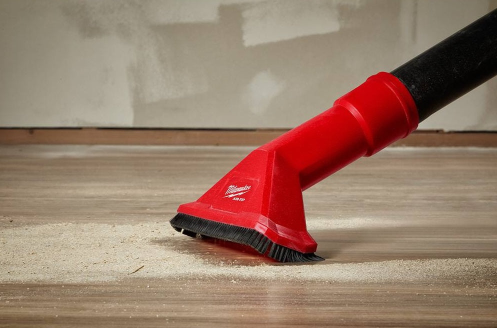 Red utility vacuum nozzle attachment with surrounding brushes for woodworking dust cleanup and home improvement tools under $50 collections