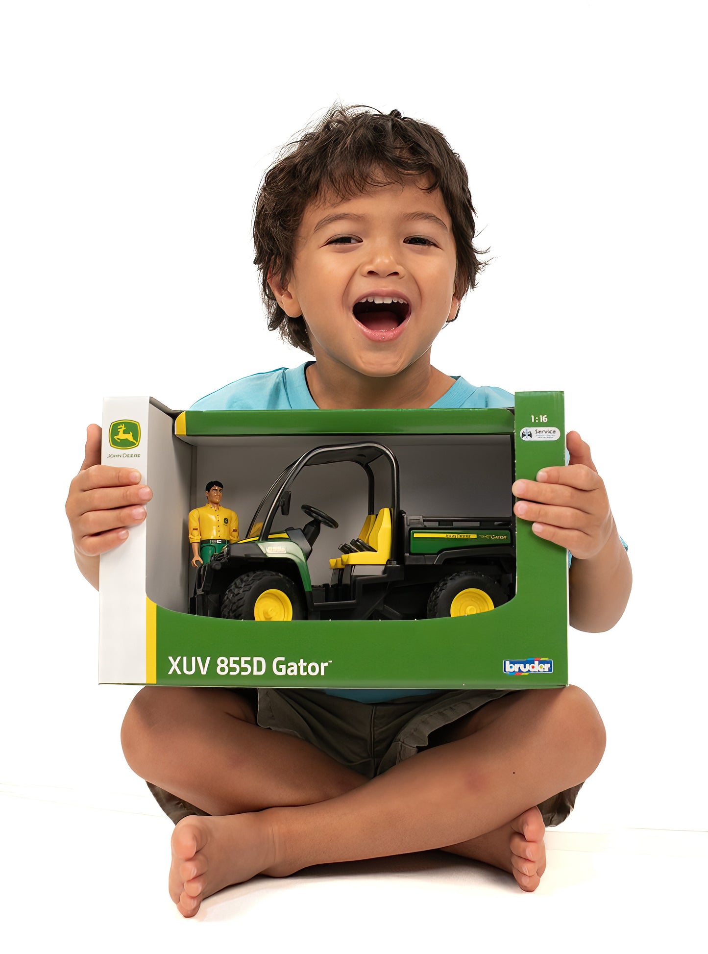 Child holding Bruder John Deere Gator toy in box from Vehicles & Remote Controlled Toys and Toys & Games collections