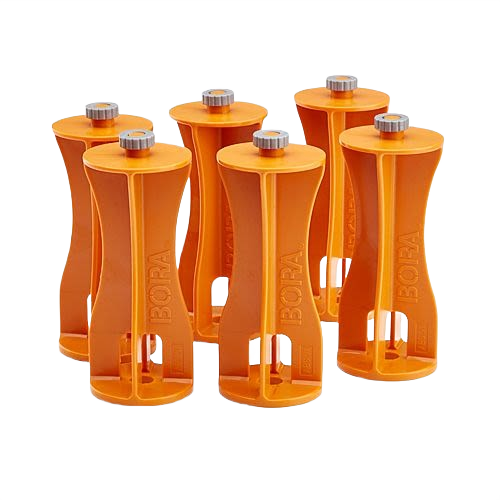 Set of six bright orange plastic risers with metal tops designed for woodworking and home improvement tasks