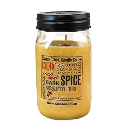 Yellow soy wax candle in clear pantry jar with black lid and warm cinnamon spice label for home ambiance