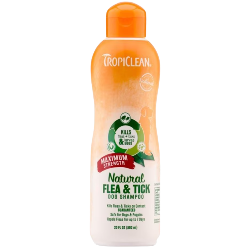 Bottle of TropiClean natural flea and tick shampoo with max strength formula for dogs and puppies, 20 oz size