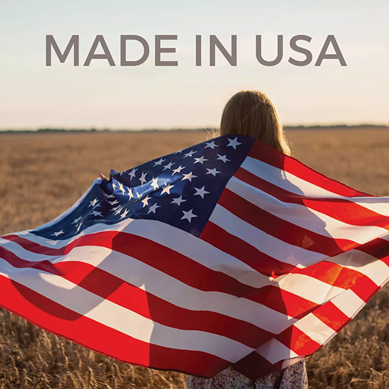 Person standing in a field wrapped in an American flag with "MADE IN USA" text overhead for home improvement context