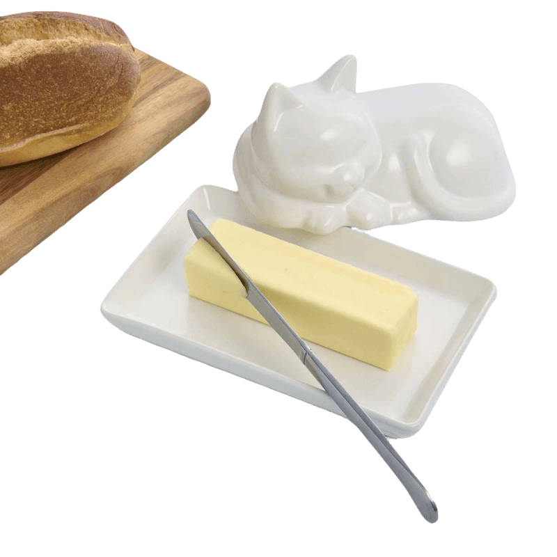 White porcelain butter dish with cat-shaped lid and stainless steel spreader for kitchen storage under $50