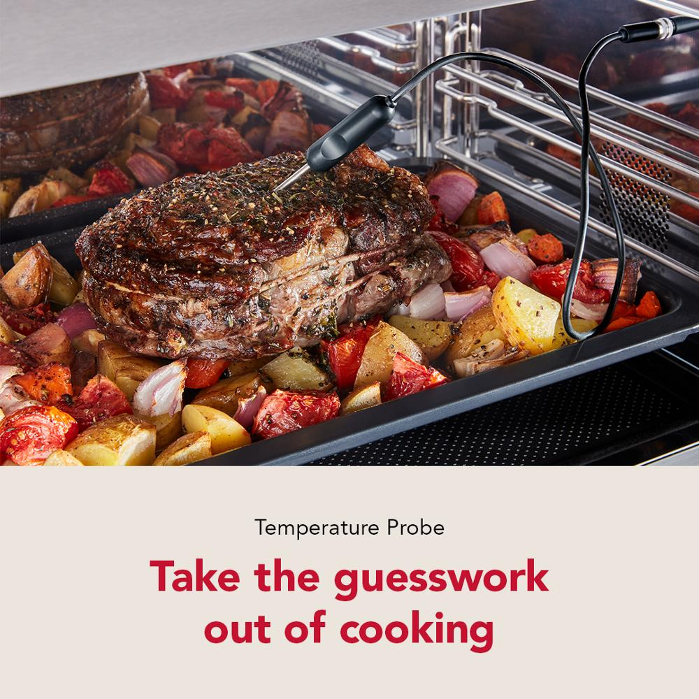 Beef roast with mixed roasted vegetables in tray using temperature probe inside convection oven from KitchenAid Appliances