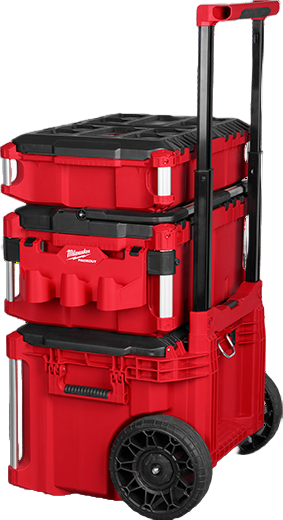 Stacked red Milwaukee PACKOUT™ modular tool storage boxes with black handles and large wheels for jobsite organization