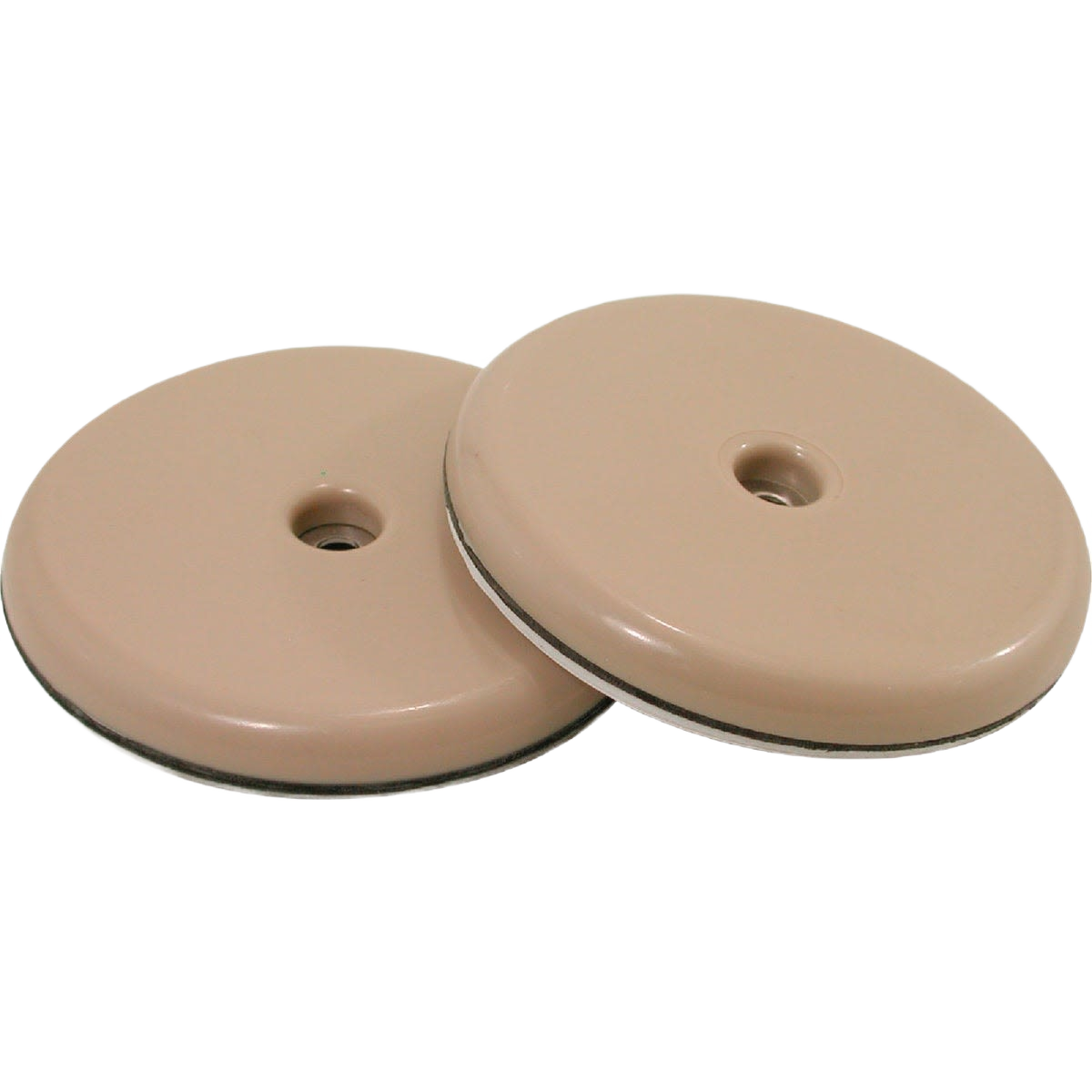 Beige round slide glides with central screw hole, designed for furniture protection and smooth movement in home improvement projects