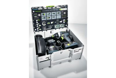 Open carrying case displaying Festool QUADRIVE cordless hammer drill kit with accessories for home improvement tasks