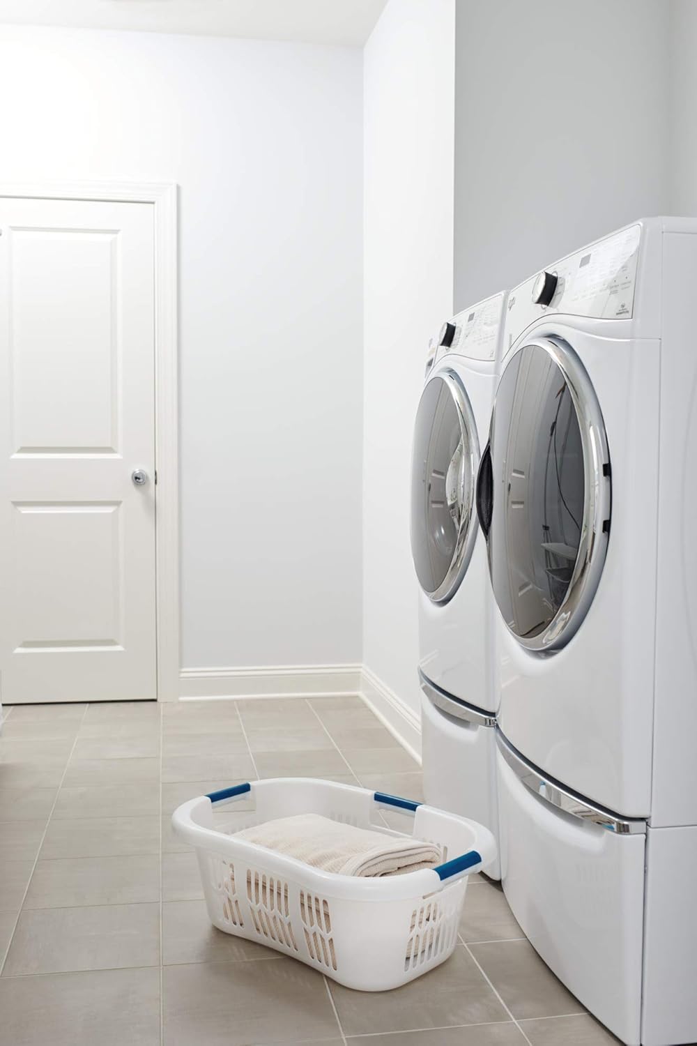 White laundry basket with three sturdy blue handles and ventilation slots for household laundry and storage organization under $50