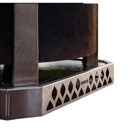 Steel fire pit base with decorative cutouts, designed for safe use on decks, patios, and outdoor living spaces