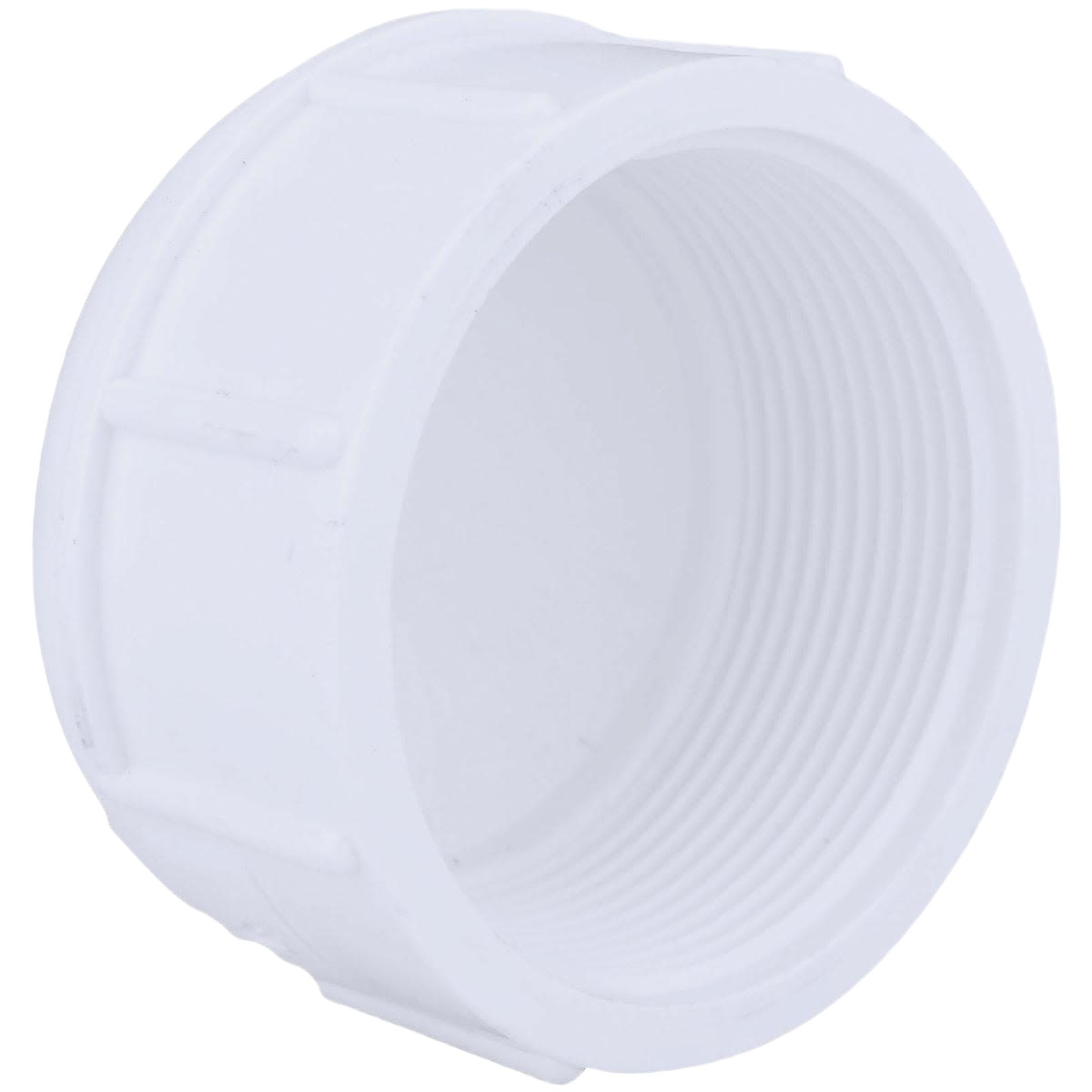 White threaded PVC pipe cap for plumbing use, part of Pipes & Fittings collection for home improvement projects