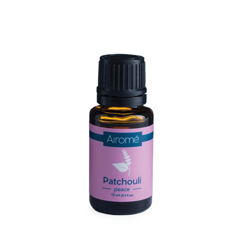 Amber glass bottle of Airome Patchouli essential oil with black cap and pink label in home decor under $50 collection