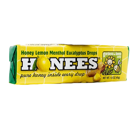 Yellow and green box of menthol lemon eucalyptus honey drops with bee and honey dipper for candy and food collections