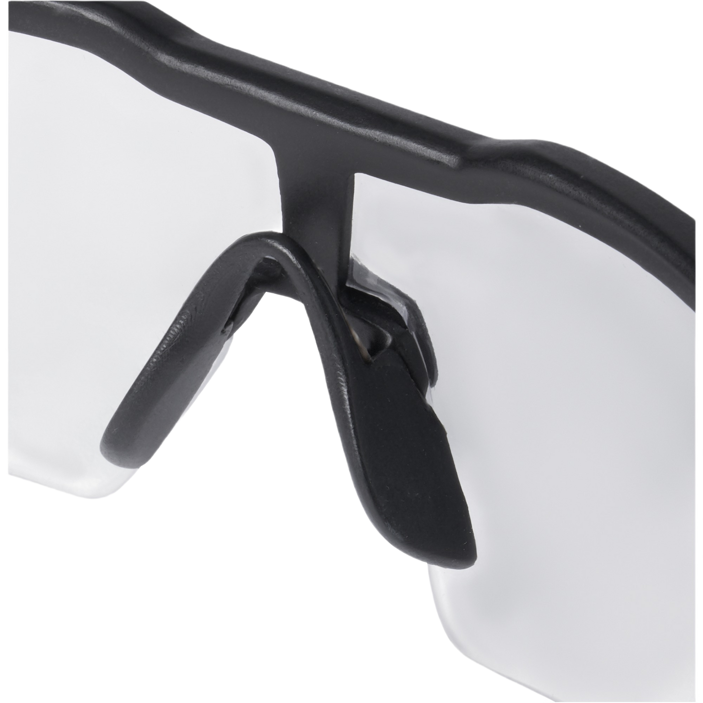 Close-up of clear lens safety glasses with black nose bridge for protective eyewear in hardware and safety gear collections