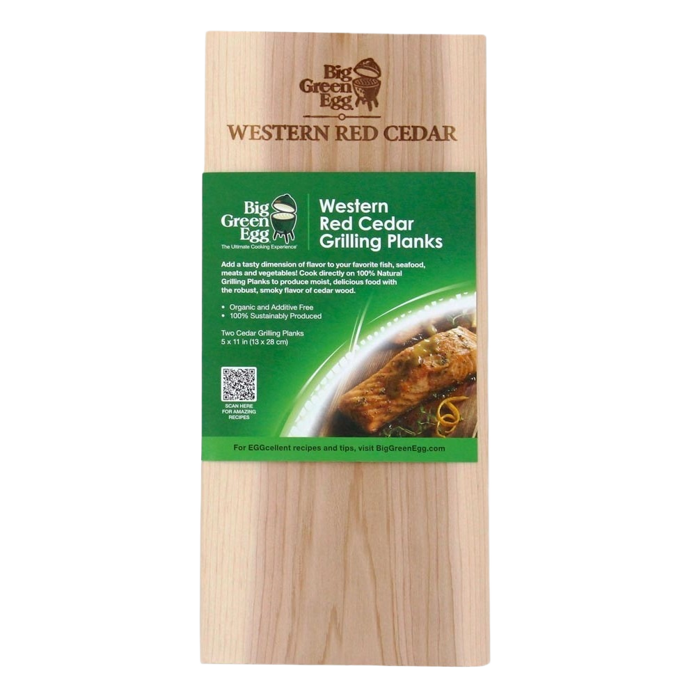 Pair of natural western red cedar grilling planks with branded packaging for outdoor cooking and grilling accessories.