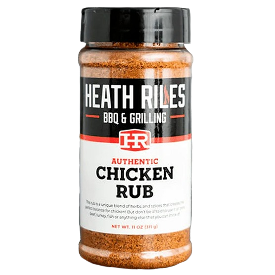 Clear plastic spice jar with black lid containing reddish brown chicken rub seasoning for BBQ and grilling recipes