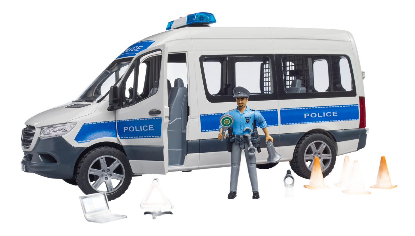 White and blue police emergency van toy with officer figure, cones, traffic sign, megaphone, and laptop accessories