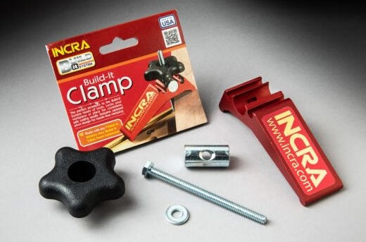 Red INCRA Build-It Clamp components with black star knob and metal hardware for woodworking and clamping tools collections
