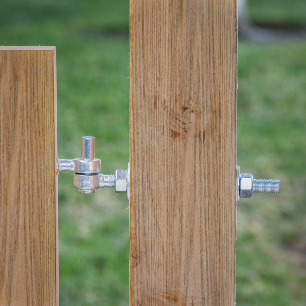 Zinc-plated bolt hook and nuts securing wooden gate slats for durable door and gate hardware under $50 collection
