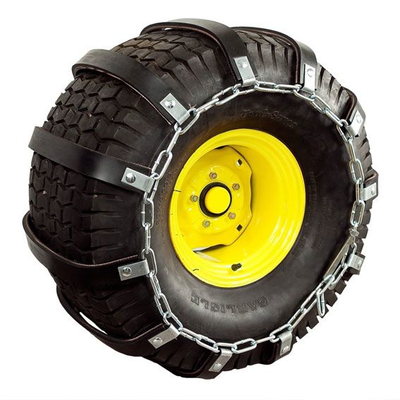 Rubber traction belt with metal chain and buckle system for enhanced grip on large black tire with yellow hub