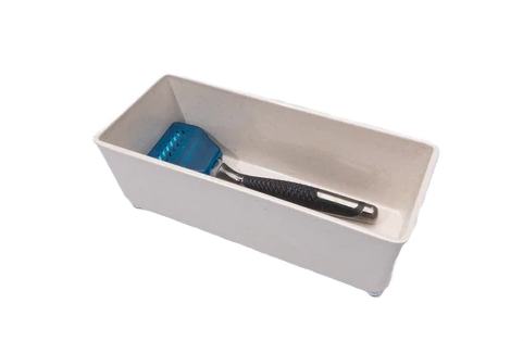 Rectangular natural bamboo melamine organizer tray with black and blue vegetable peeler inside for kitchen storage