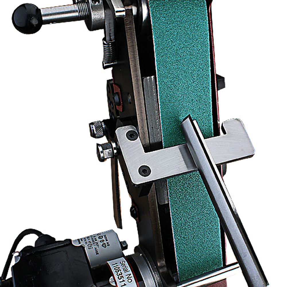 Green abrasive belt on compact sharpening tool platform with metal components for home improvement projects