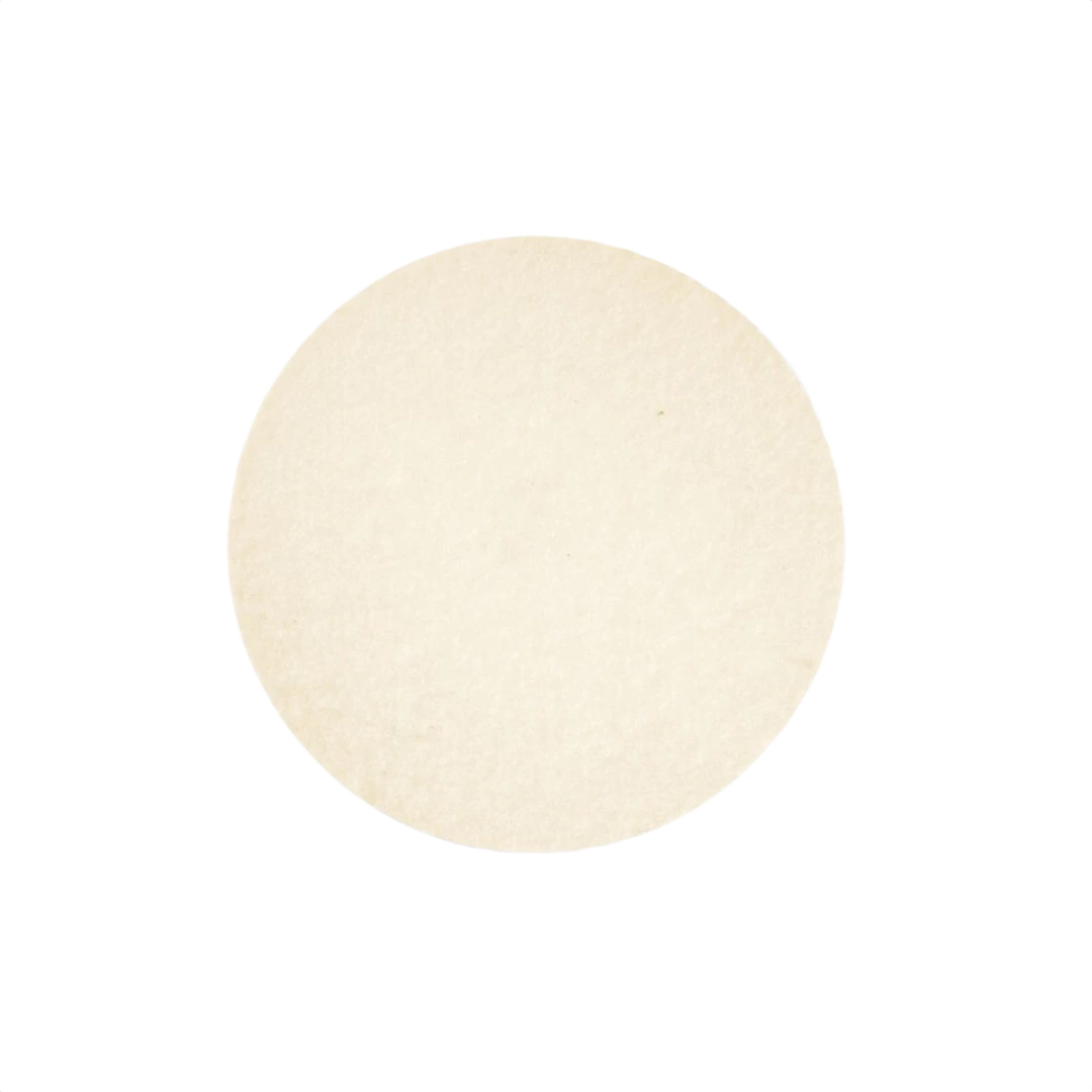 Hard felt polishing disc in light beige color for woodworking tool accessories and finishing tasks