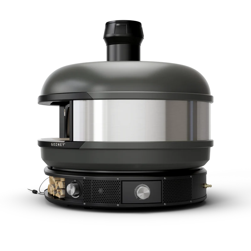 Modern black and stainless steel pizza oven with wood storage and control knobs for outdoor grilling and lawn use