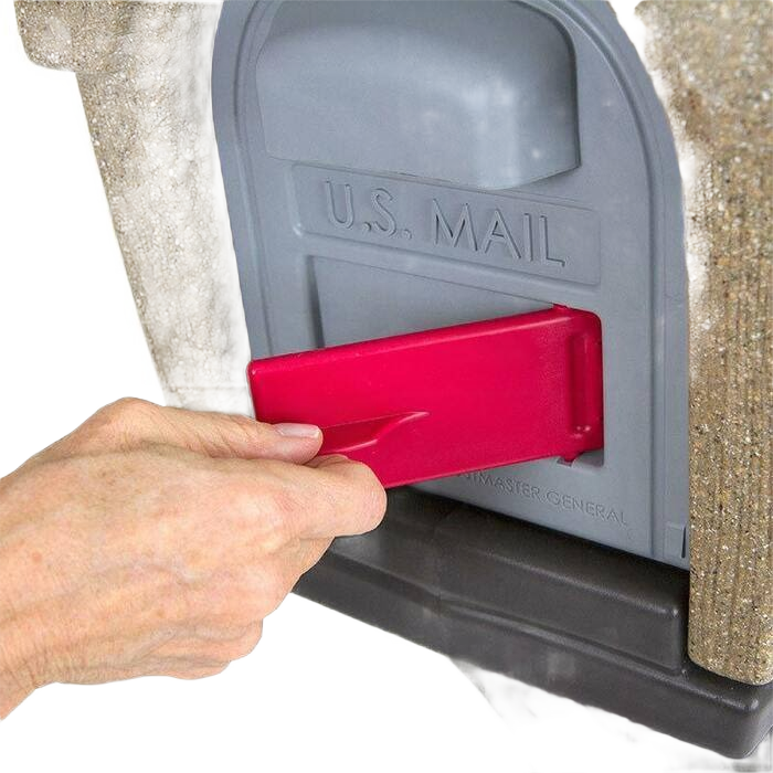 Hand opening gray outdoor mailbox with red flag on textured rustic post for home improvement use