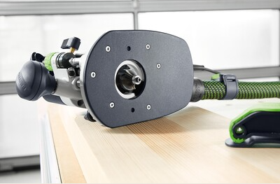 Festool black table widener attached to edge router for woodworking tool accessories in home improvement projects