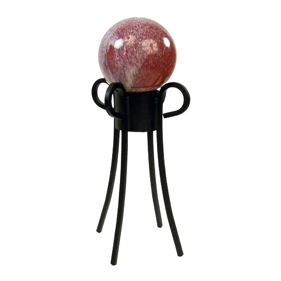 Black metal four-leg globe display stand holding a polished decorative red stone sphere for home decor use