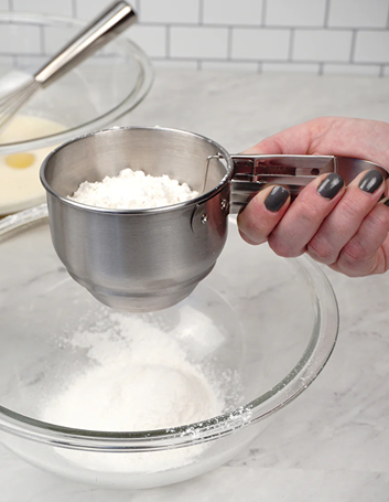 Brushed stainless steel 1-cup sifter with vintage handle for precise flour sifting in kitchen tools use