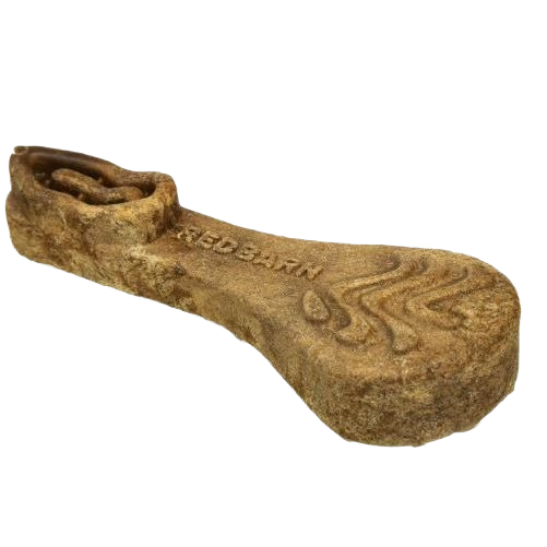 Brown textured dog dental chew shaped like a brush with embossed branding for pet treats and supplies collections