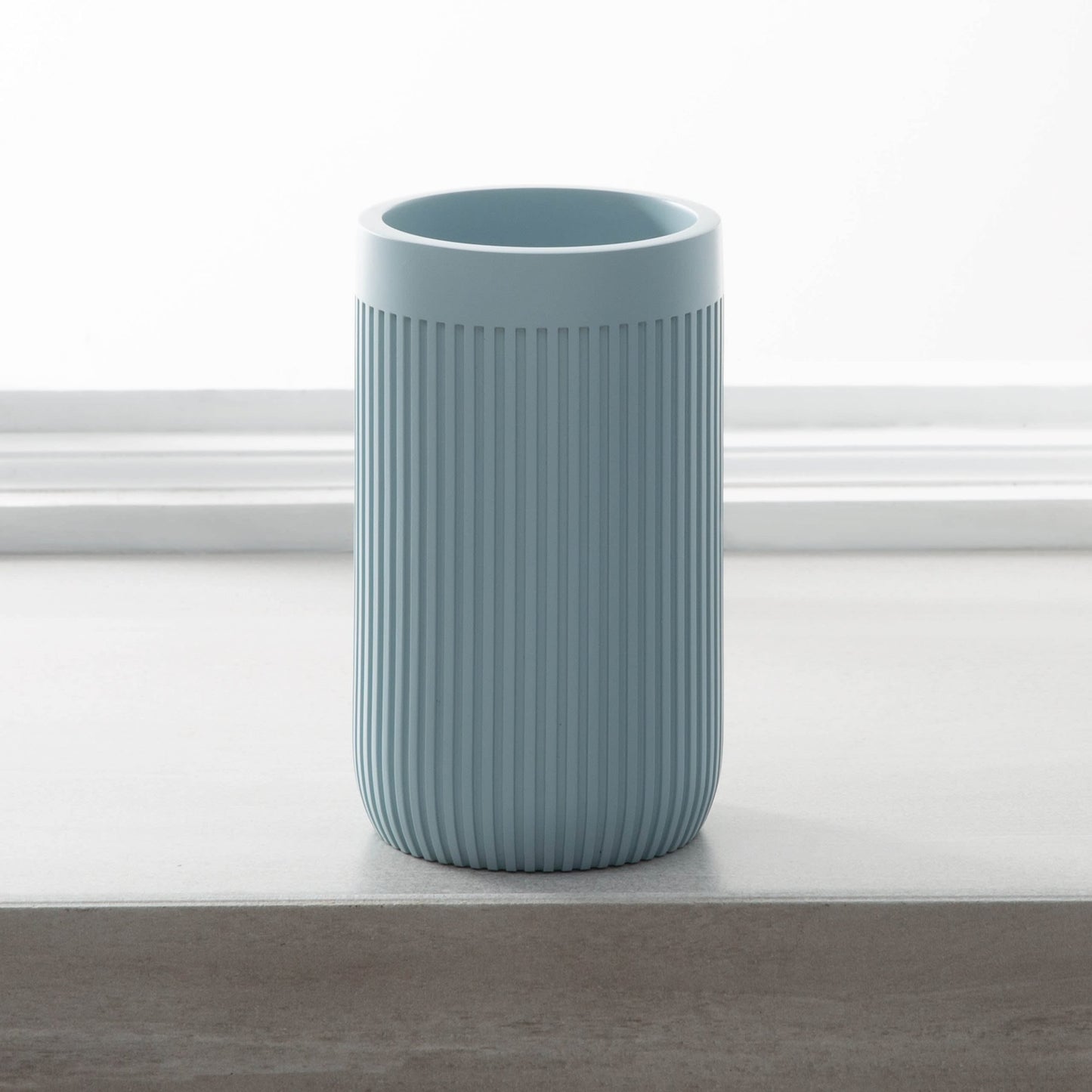 Blue ribbed resin tumbler for bathroom counter with modern design in bath and safety collections under $50