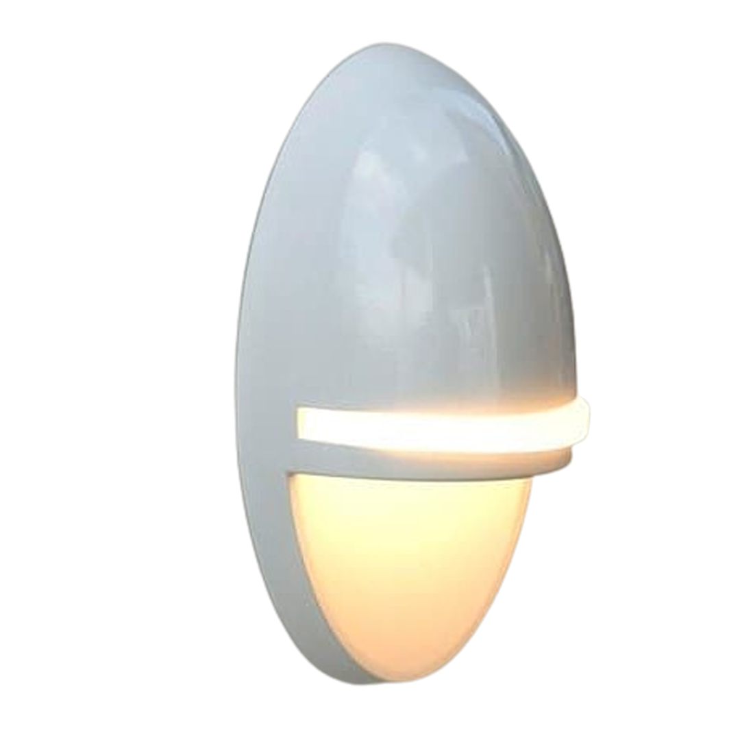 Matte white LED accent light with sleek rounded design casting warm illumination for home improvement spaces