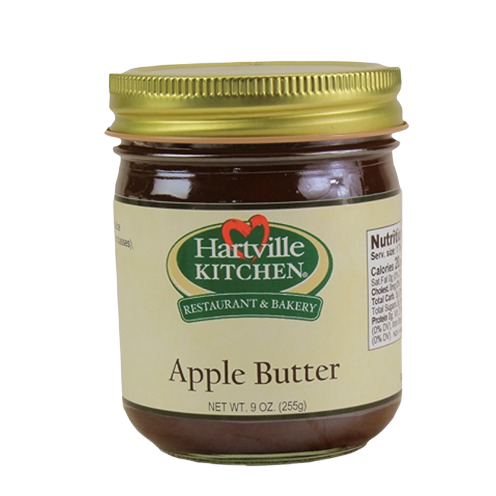Glass jar of Hartville Kitchen apple butter with gold lid in jams and jellies and food and beverage collections