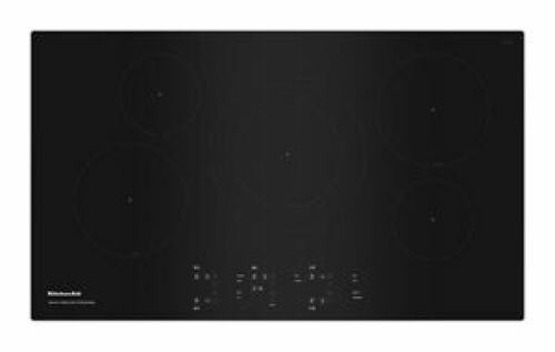 Black glass induction cooktop with five cooking zones and sleek touch control panel from kitchen appliances collection