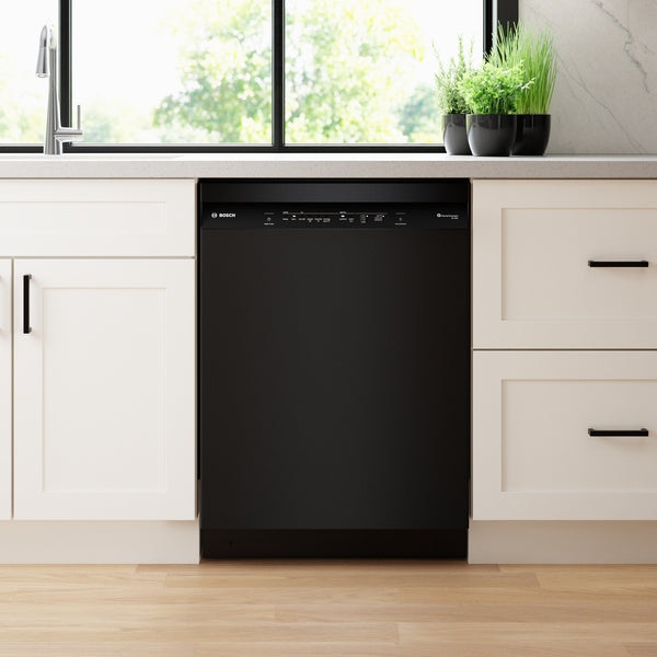 Black 24-inch built-in dishwasher with sleek control panel, integrated in bright kitchen cabinetry from Bosch appliances collection