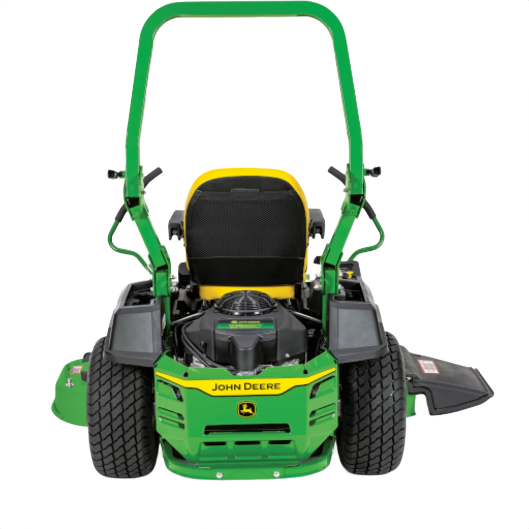 Rear view of green and yellow riding mower with roll bar and wide rear tires for home landscaping and lawn care tasks