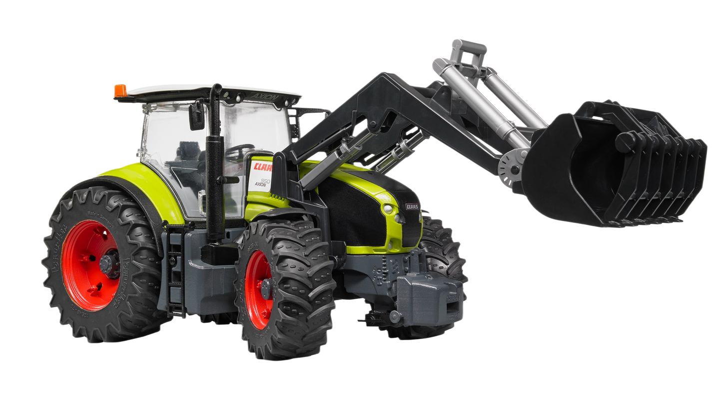Bright green and red Bruder Claas Xerion 5000 Tractor model with front loader in Vehicles & Remote Controlled Toys collection