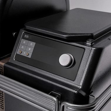 Close-up of black Ironwood wood pellet grill WiFIRE® control panel with digital display and dial knob for temperature settings
