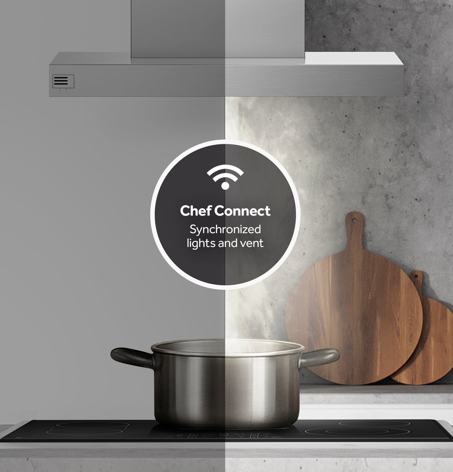 Modern stainless steel vent hood with wireless Chef Connect feature over pot steaming on black cooktop in kitchen setting