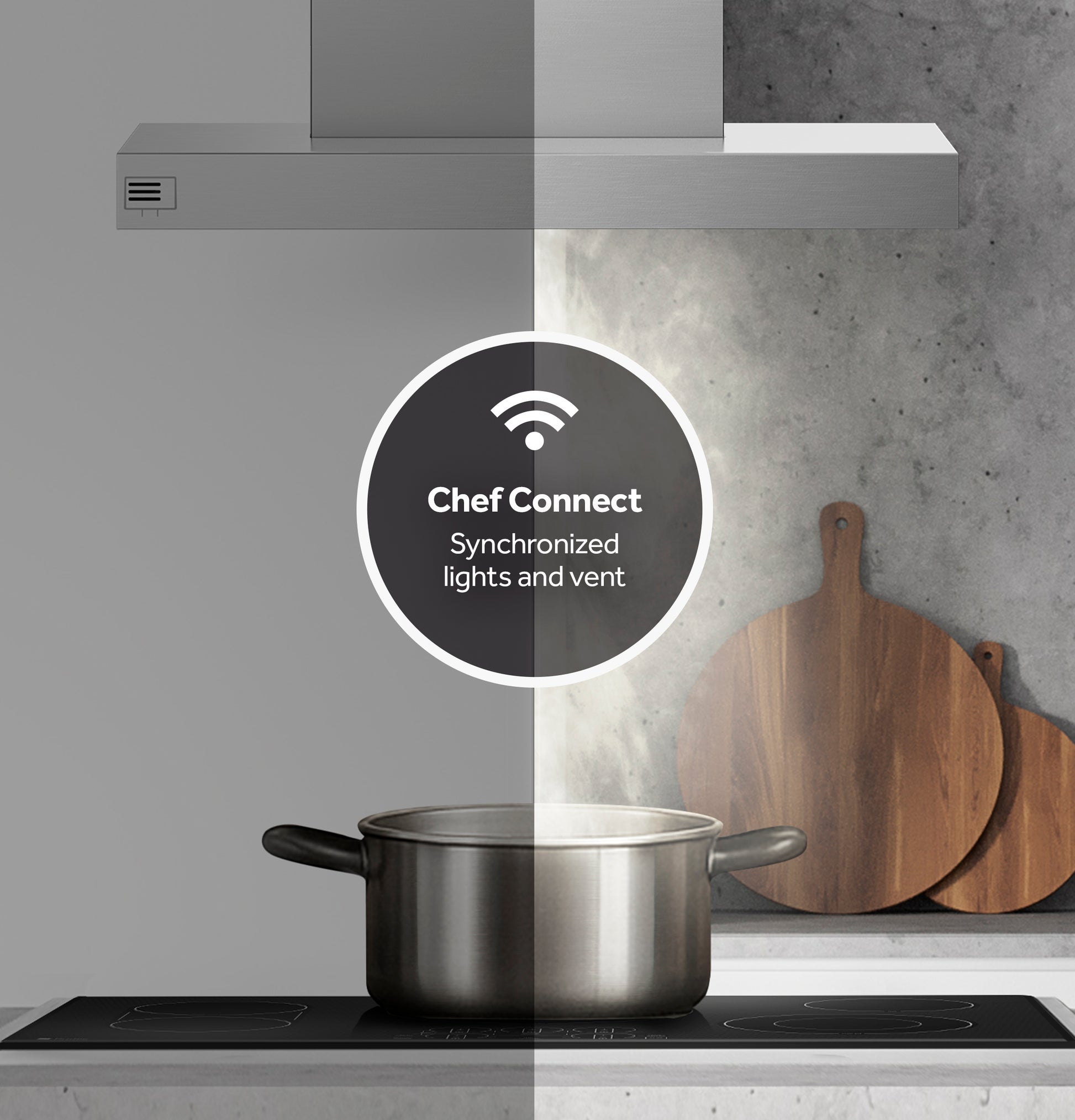 Modern stainless steel vent hood with wireless Chef Connect feature over pot steaming on black cooktop in kitchen setting